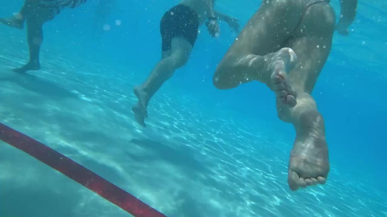 Teen butt swimming right in front of voyeurs camera
