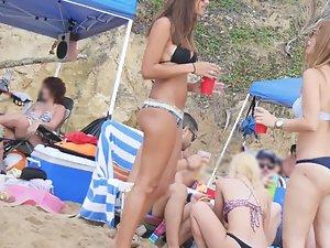 Sexy teens dance and drink on beach Picture 1