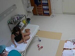 Spying on doctor checking hot woman's ass Picture 1