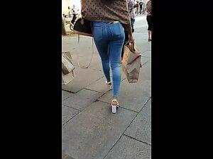 Stylish girl sways her sexy hips when she walks Picture 1