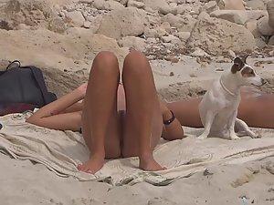 Lesbian girl relaxes on small nudist beach Picture 4