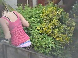 Neighbor lady cleans in the yard Picture 7