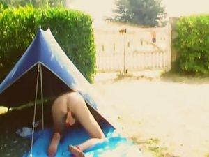 Energetic girl spied with a dildo in a tent Picture 5