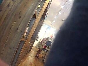 Upskirt while interacting with curvy blonde store clerk Picture 2