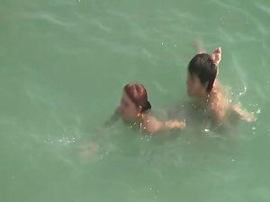 Horny couple trying to fuck in the water Picture 6