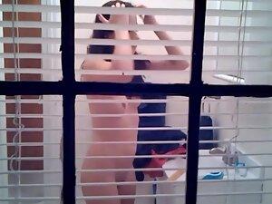 Window peeping on hot naked neighbor in her bathroom