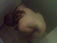 Spying a girl shaving under a shower Picture 6