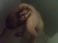Spying a girl shaving under a shower Picture 7