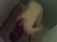 Spying a girl shaving under a shower Picture 8