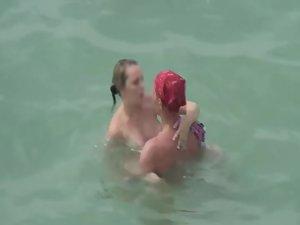 Two couple fucking in the water Picture 2