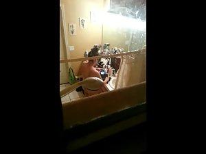 Peeping on big naked woman through window Picture 1