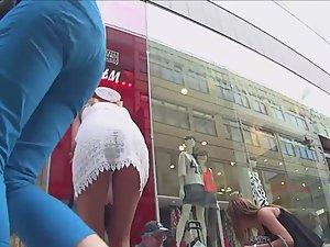 Upskirt of elegant woman in white lace dress Picture 2