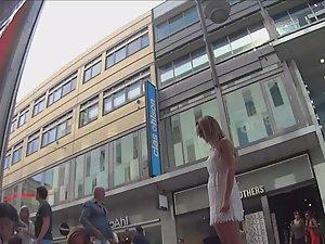 Upskirt of elegant woman in white lace dress Picture 6