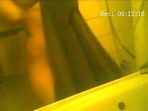 Nice angle on sister naked in a shower Picture 2