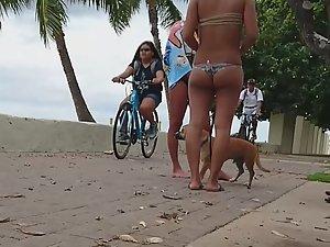 Hot girls play with dog by the beach Picture 4