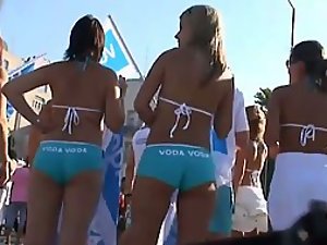 Young hostesses in matching hot pants