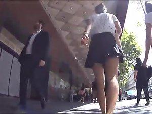 Keeping pace with a chick in a short skirt Picture 2
