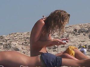 Fabulous natural topless tits on beach Picture 4