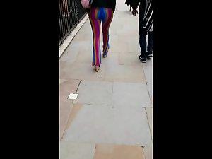 Voyeur follows a big butt in rainbow pants Picture 2
