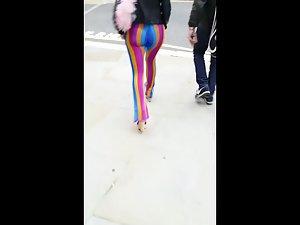 Voyeur follows a big butt in rainbow pants Picture 3