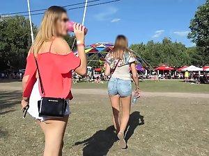 Sexy friends in shorts on a music festival Picture 1