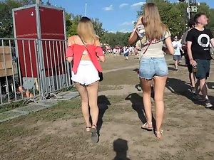 Sexy friends in shorts on a music festival Picture 2