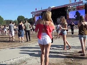 Sexy friends in shorts on a music festival Picture 3