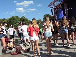 Sexy friends in shorts on a music festival Picture 7