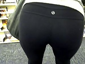Sexy girl in tights at the book store