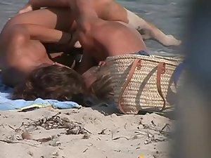 Couple making out on a beach Picture 2