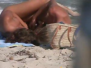 Couple making out on a beach Picture 3