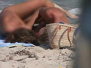 Couple making out on a beach Picture 4