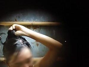 Peeping on an asian girl washing up Picture 2