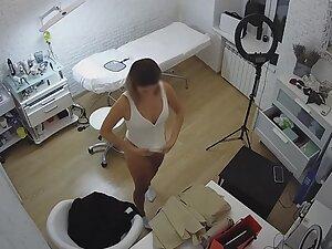 Spying on beautician changing clothes in her beauty salon Picture 6
