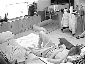 Hidden cam caught horny girl masturbate while boyfriend is in the room Picture 1