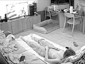Hidden cam caught horny girl masturbate while boyfriend is in the room Picture 8