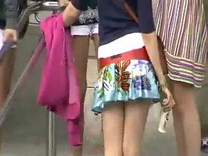 Wind lifted cute girl's short skirt Picture 7