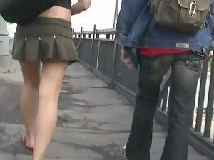Peeping under short skirt on stairs Picture 5