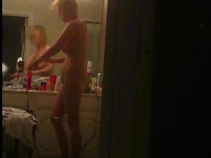Wife applying skin lotion after a shower Picture 8