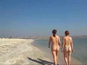 Following two hot women on the beach Picture 3
