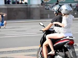 Girl on motorcycle shows some skin Picture 2