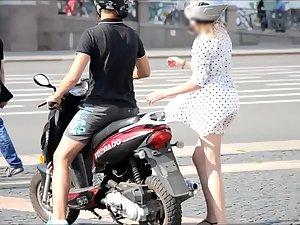 Girl on motorcycle shows some skin Picture 3