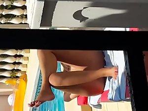 Naked milf relaxes by a private pool Picture 5