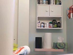 Peeping on young tits and hairy pussy in bathroom Picture 1