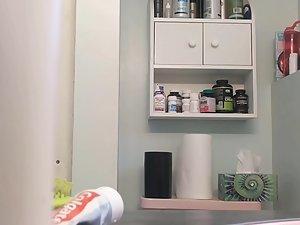 Peeping on young tits and hairy pussy in bathroom Picture 2