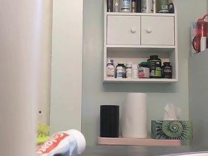 Peeping on young tits and hairy pussy in bathroom Picture 3