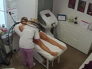 Hidden cam caught sexy tattooed milf getting hair removal Picture 2