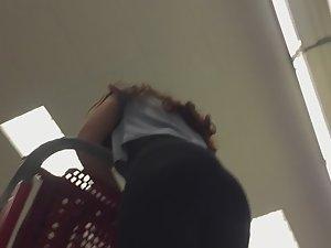 Young redhead in supermarket Picture 7