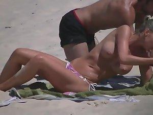 Voyeuring a topless girl's big fake tits Picture 3