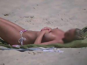 Voyeuring a topless girl's big fake tits Picture 5